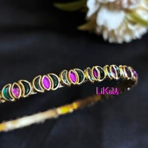Bloom Brass Headband adorned with alternating green and magenta kundan stones - Image 3