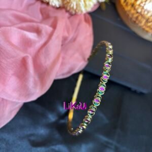 Bloom Brass Headband adorned with alternating green and magenta kundan stones